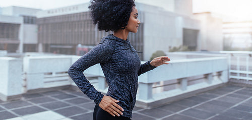 Woman running in the city