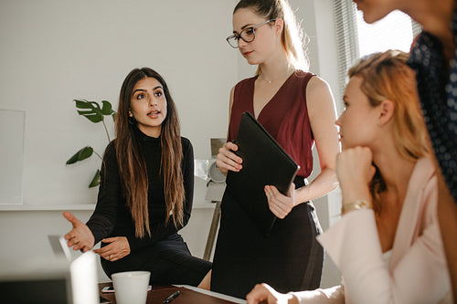 Businesswomen in discussion at office