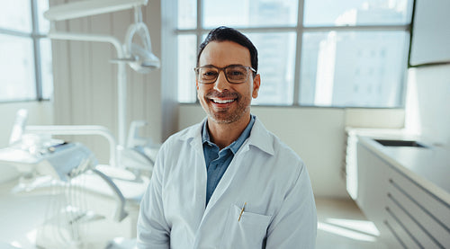 Orthodontics specialist dentist smiling in a clean modern clinic