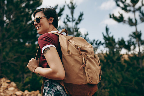Woman on a holiday trekking in the woods