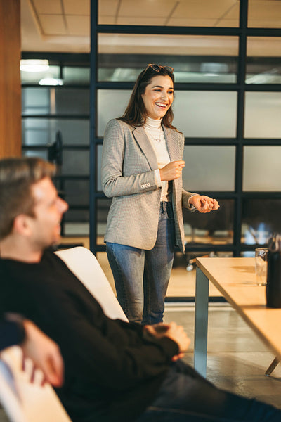 Diverse team engaging in productive discussion in a professional office environment