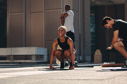 People having fun while exercising together