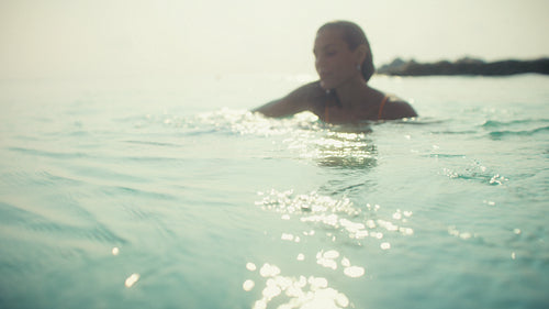 Happy mother and daughter enjoy precious family time and snorkeling at a tropical beach resort