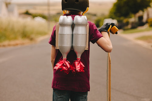 Kid with jetpack and skatebord