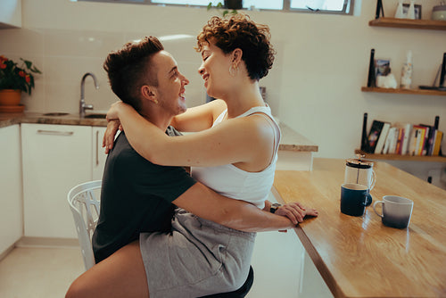 Couple being cozy in the kitchen
