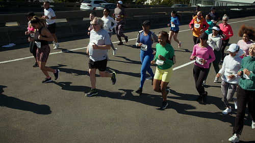 Crowd of people running a marathon