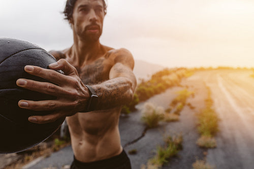 Athlete exercising outdoors on a rainy day