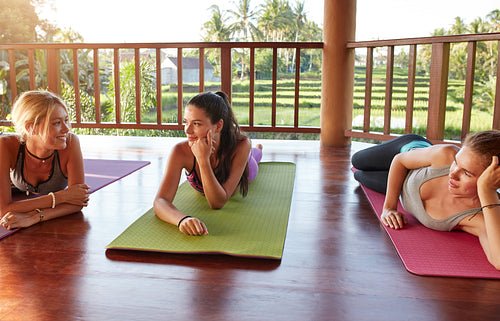 Female friends during yoga class break