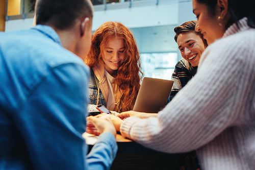 Students using their phones in library