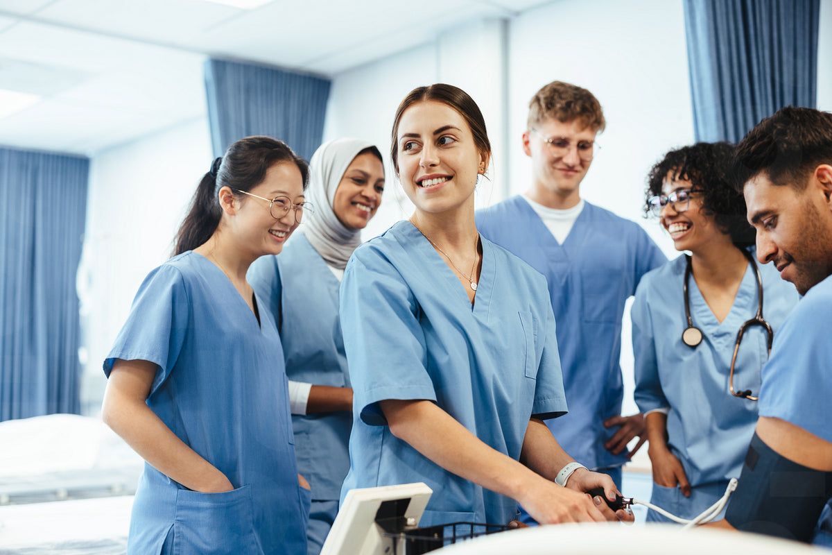 Health Trainees Healthcare students checking blood pressure in medical training – Jacob ...