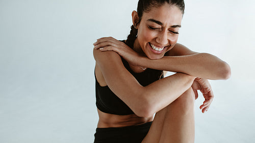 Female athlete taking a break from workout