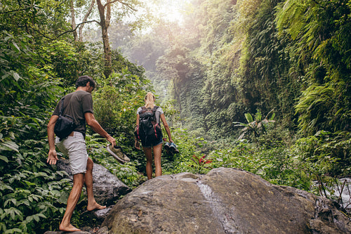 Couple hiking on mountain trail