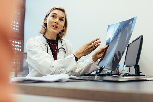 Doctor explaining checkup result to her patient