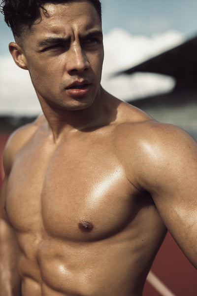 Determined sportsman with muscular body