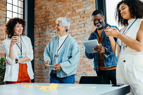 Team brainstorming session with multiethnic group of colleagues