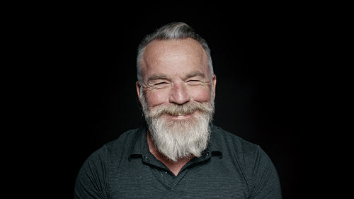 Smiling senior man with a beard