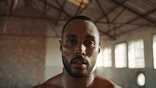 Portrait of fit man in cross training gym