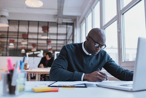 Businessman working at his desk
