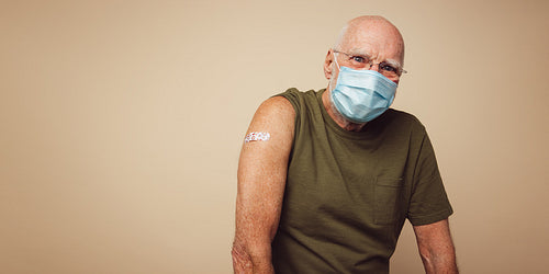 Senior man after receiving covid-19 vaccination