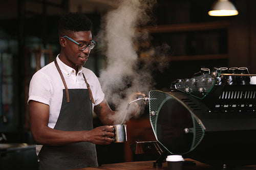 Barista preparing coffee at a coffee shop