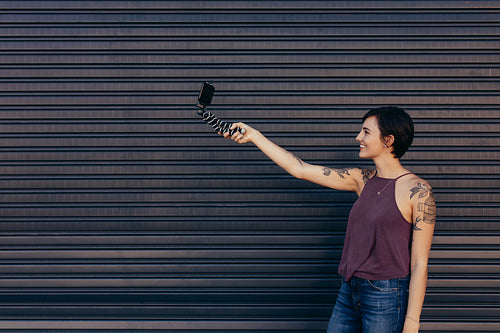 Woman blogger making a vlog with smart phone