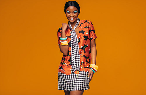 Fashion model with vivid make up in studio