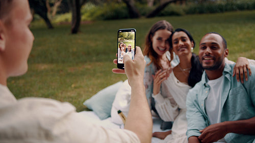 Friends making a video for social media