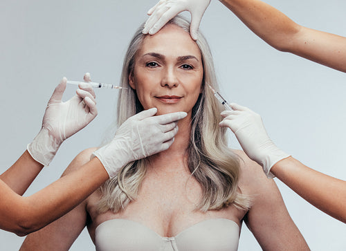 Woman getting anti aging cosmetic injections