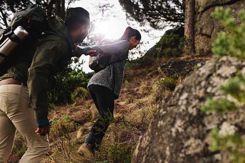 Young couple hiking in mountain
