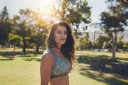 Fit young woman in sportswear at the park