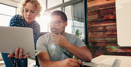 Young team of graphic designers working on new projects