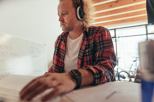 Technical support guy working in a small office
