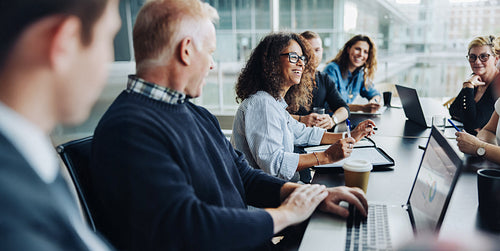 Business team meeting in light-filled office
