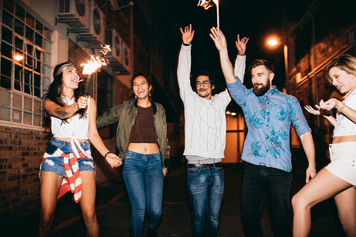 Best friends celebrating new years eve with sparklers