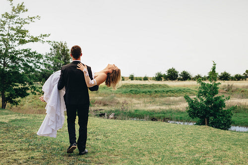 Newlywed couple at park