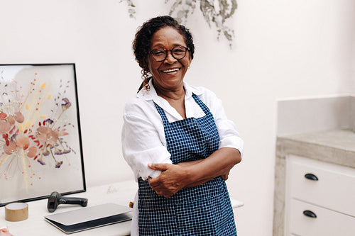 Portrait of a senior woman running a floral startup