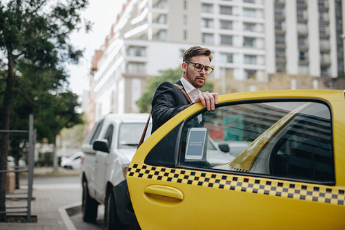Entrepreneur boarding a cab