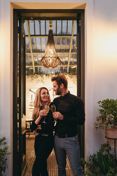Married couple toasting with wineglasses