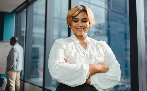 Confident black business woman in boardroom meeting