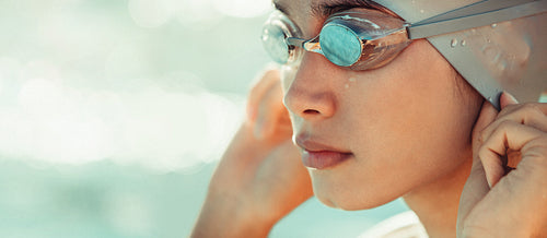Confident young female swimmer