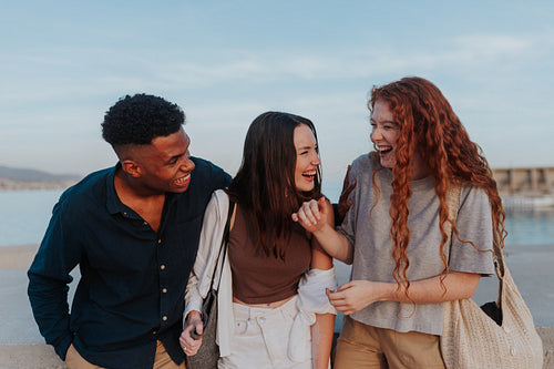 Multiethnic friends sharing a hilarious moment together