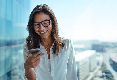 Closeup shot of businesswoman talking over mobile phone.