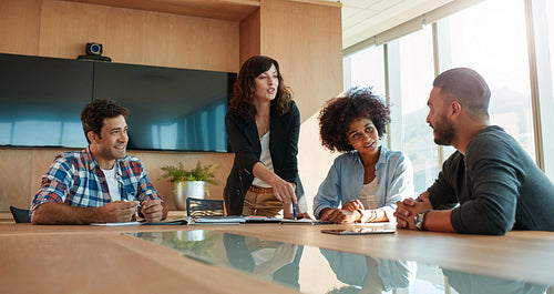 Multi ethnic business team during meeting in office