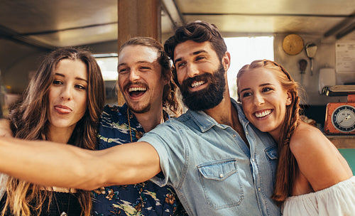 Group of friends making selfie at outdoors