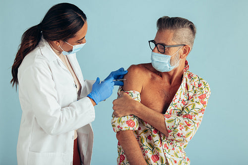 Man getting covid-19 vaccination