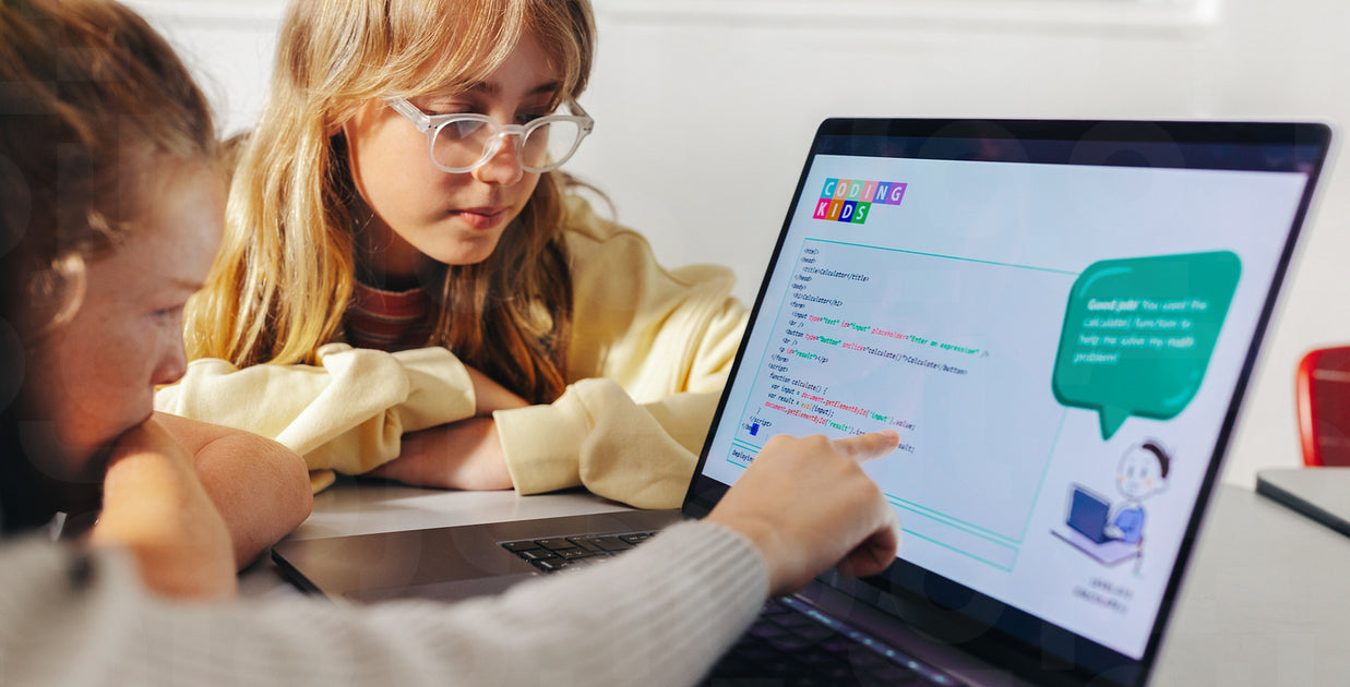 Young student explaining a code to her classmates in a programming cla ...