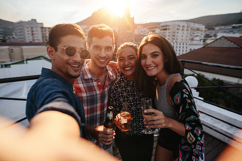 Group of friends taking selfie