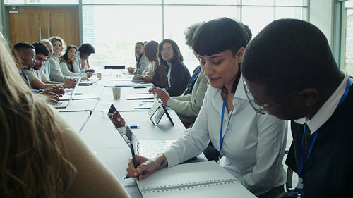 Diverse group attending conference session