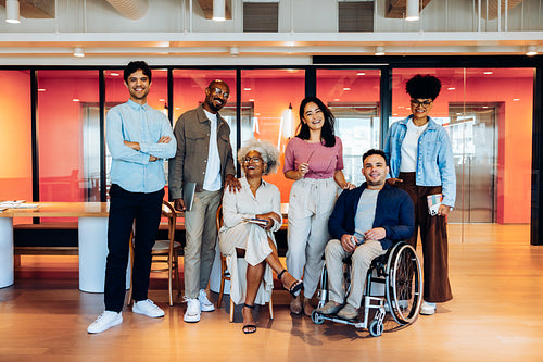 Group of diverse friends at a modern office