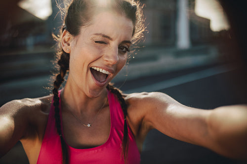 Fitness woman having fun in workout break
